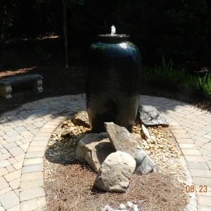 fountain near brick path