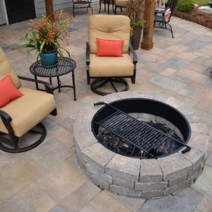 firepit with stone wall and furniture