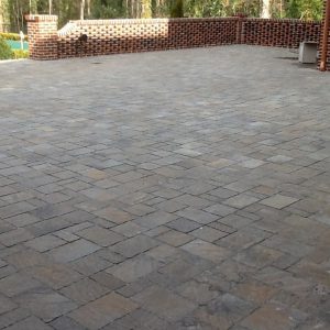 brick patio with brick wall