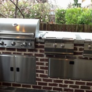 outdoor grill with red brick