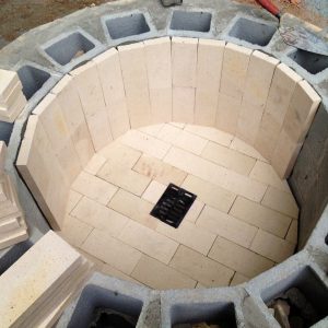 firepit being built with bricks