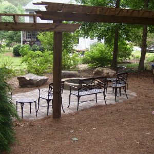 patio furniture under pergola