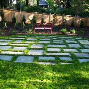 brick patio and purple bench