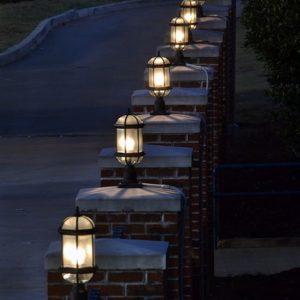 outdoor lighting on brick walls