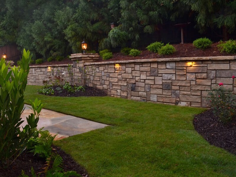 lawn and stone wall