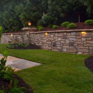 outdoor lighting and stone wall