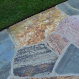 stone floor near green grass