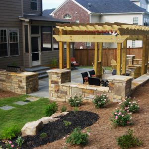 pergola and stone wall