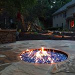 blue firepit on outdoor patio